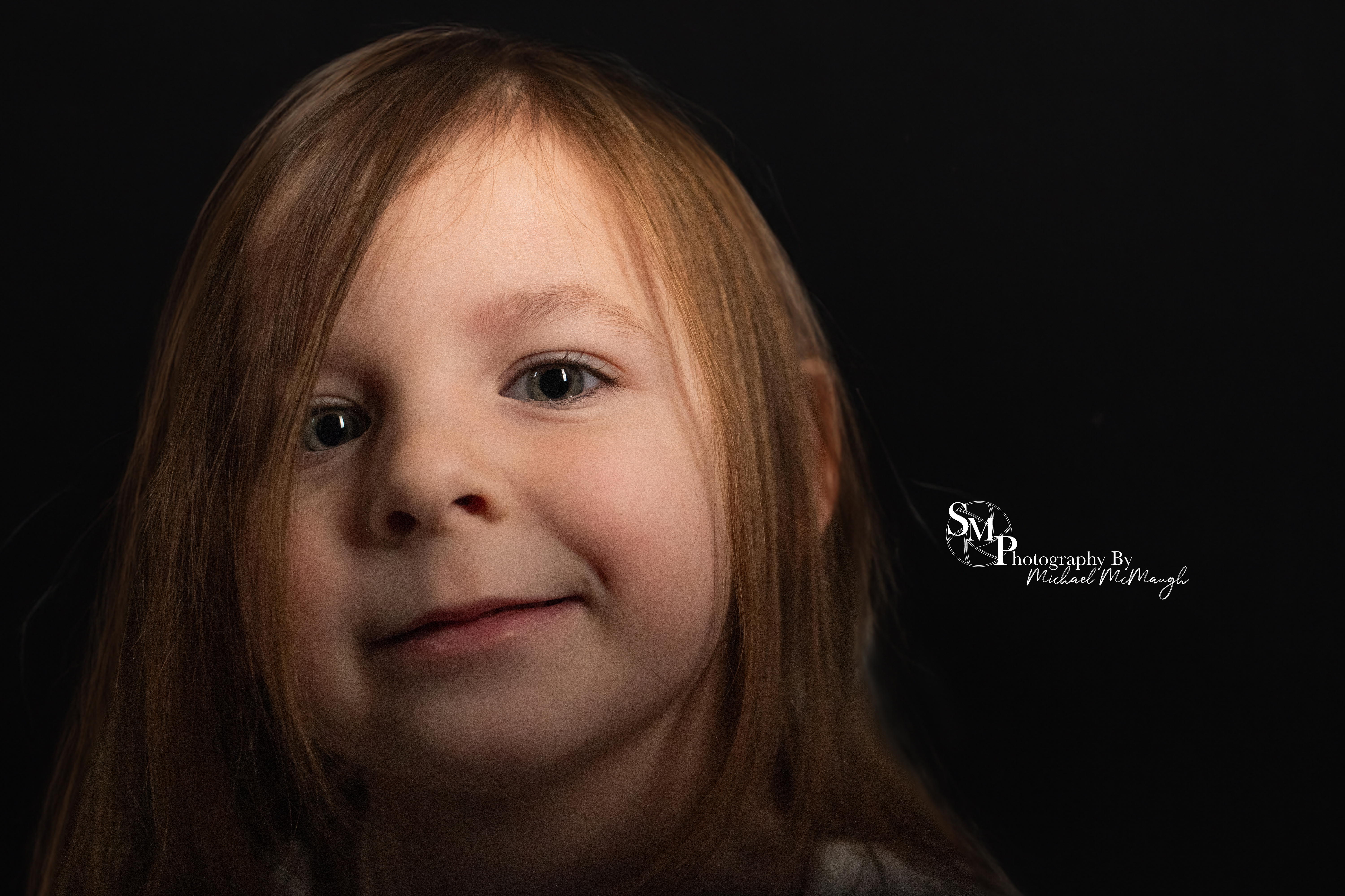 Child Portrait shot by Michael McMaugh of Shuttering Moments. Michael has been a photographer for over 20 years and works in various industries creating content for business and individuals.